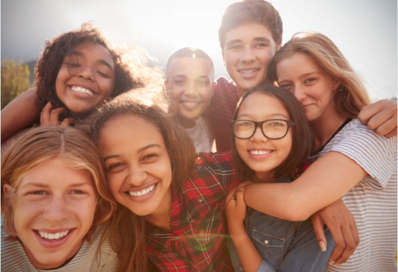 Group of happy adolescents