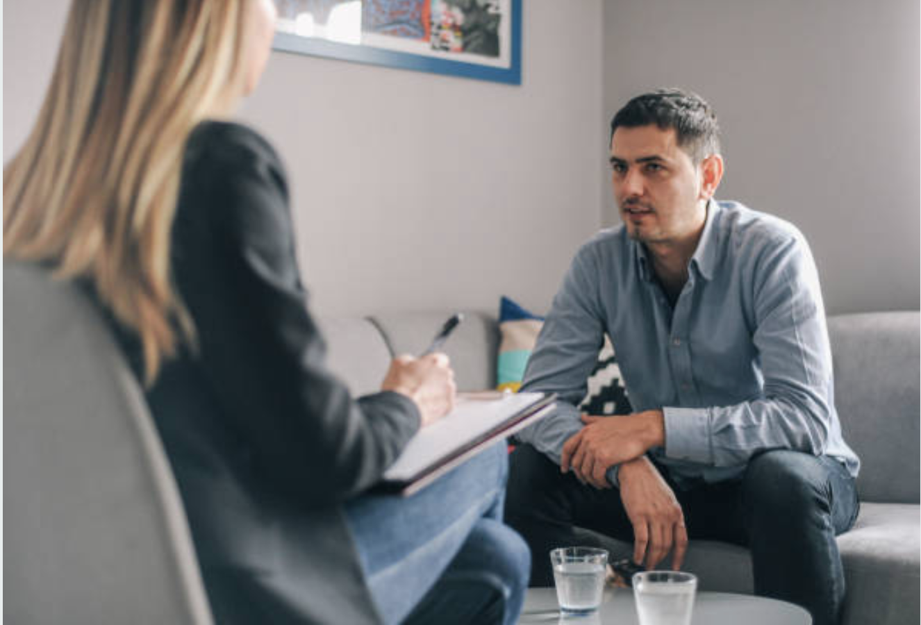 Man walking with therapist